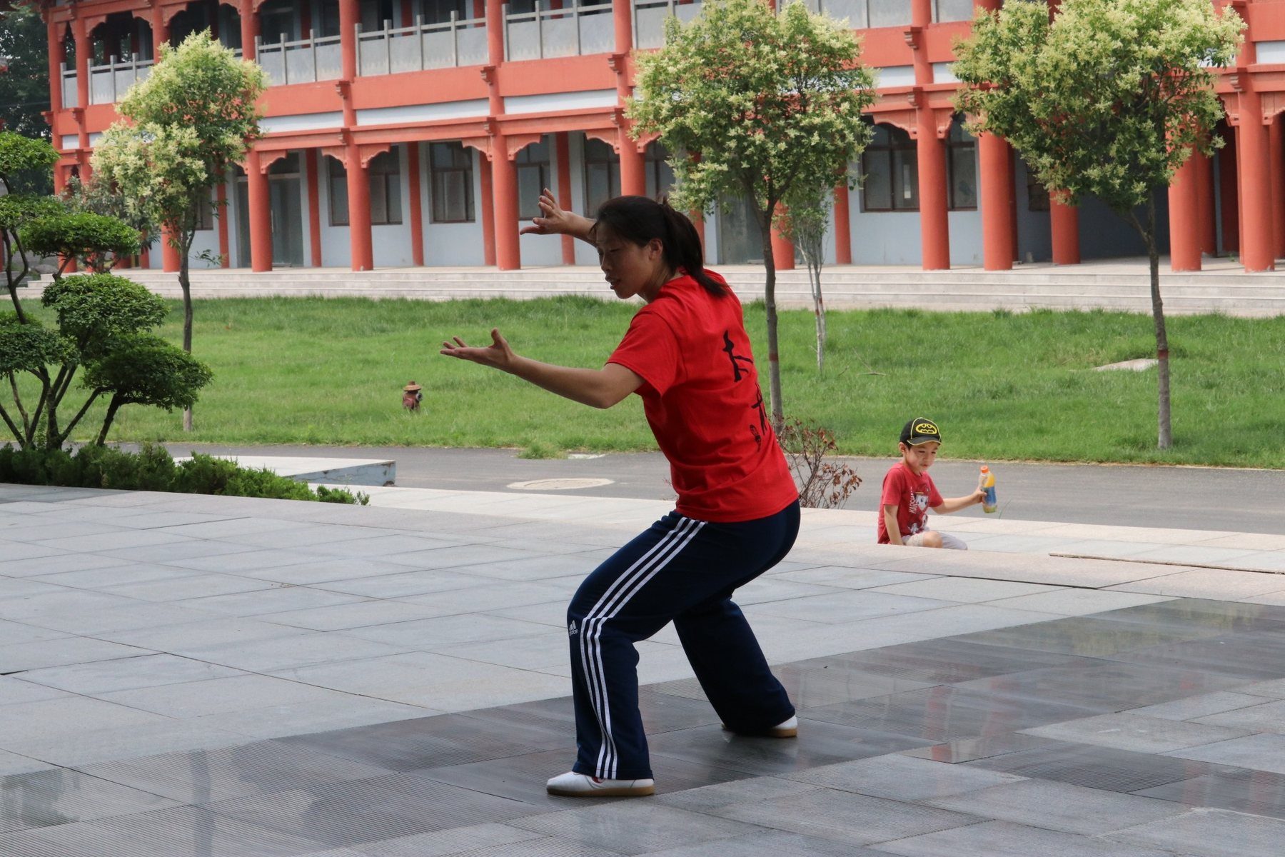 Master Chen Huixian demonstrating spiraling arm movement in Chenjiagou